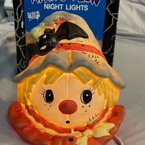 Halloween night lights. Lighted ceramic scarecrow decoration